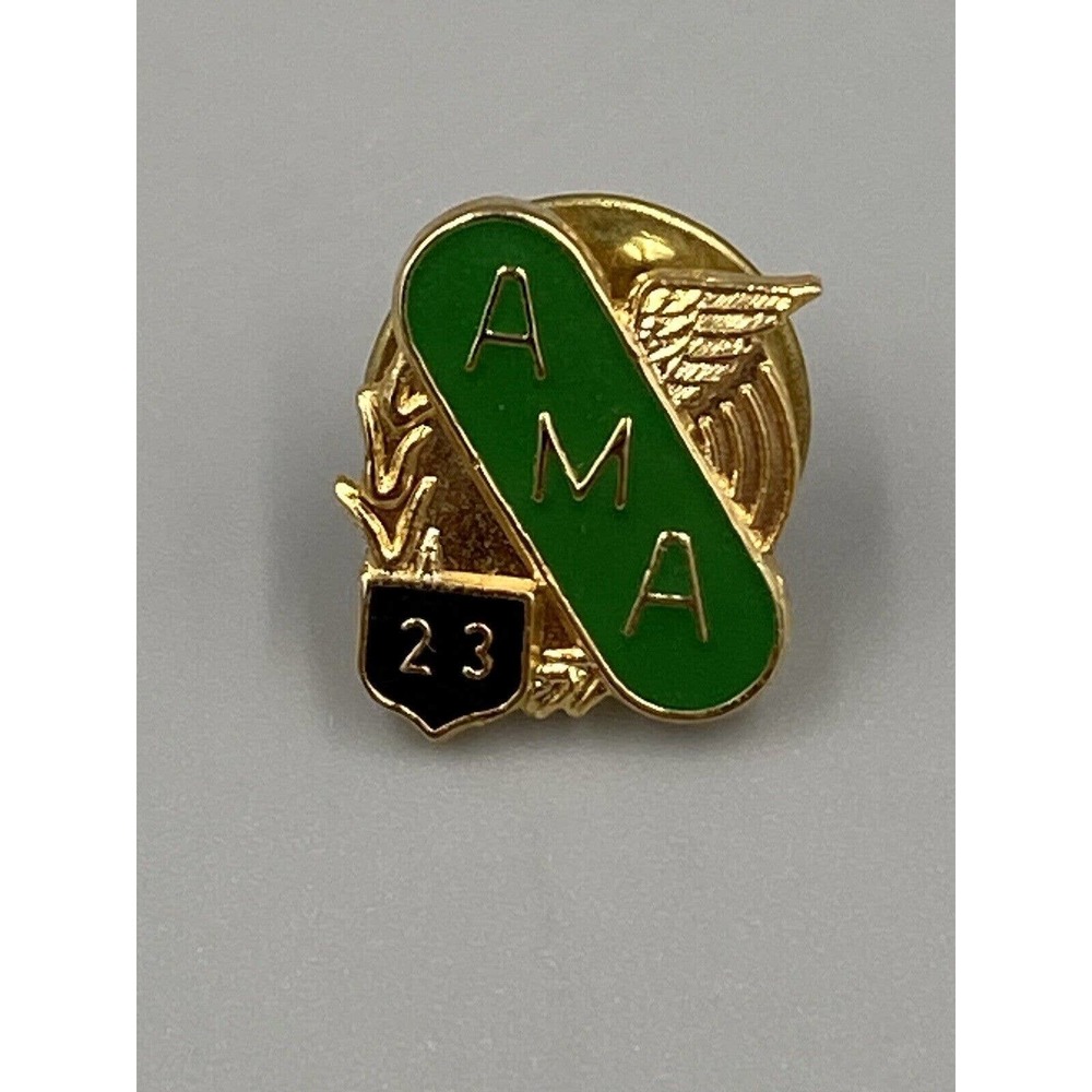 AMA 23 Green & Gold Colored Lapel Hat Vest Pin